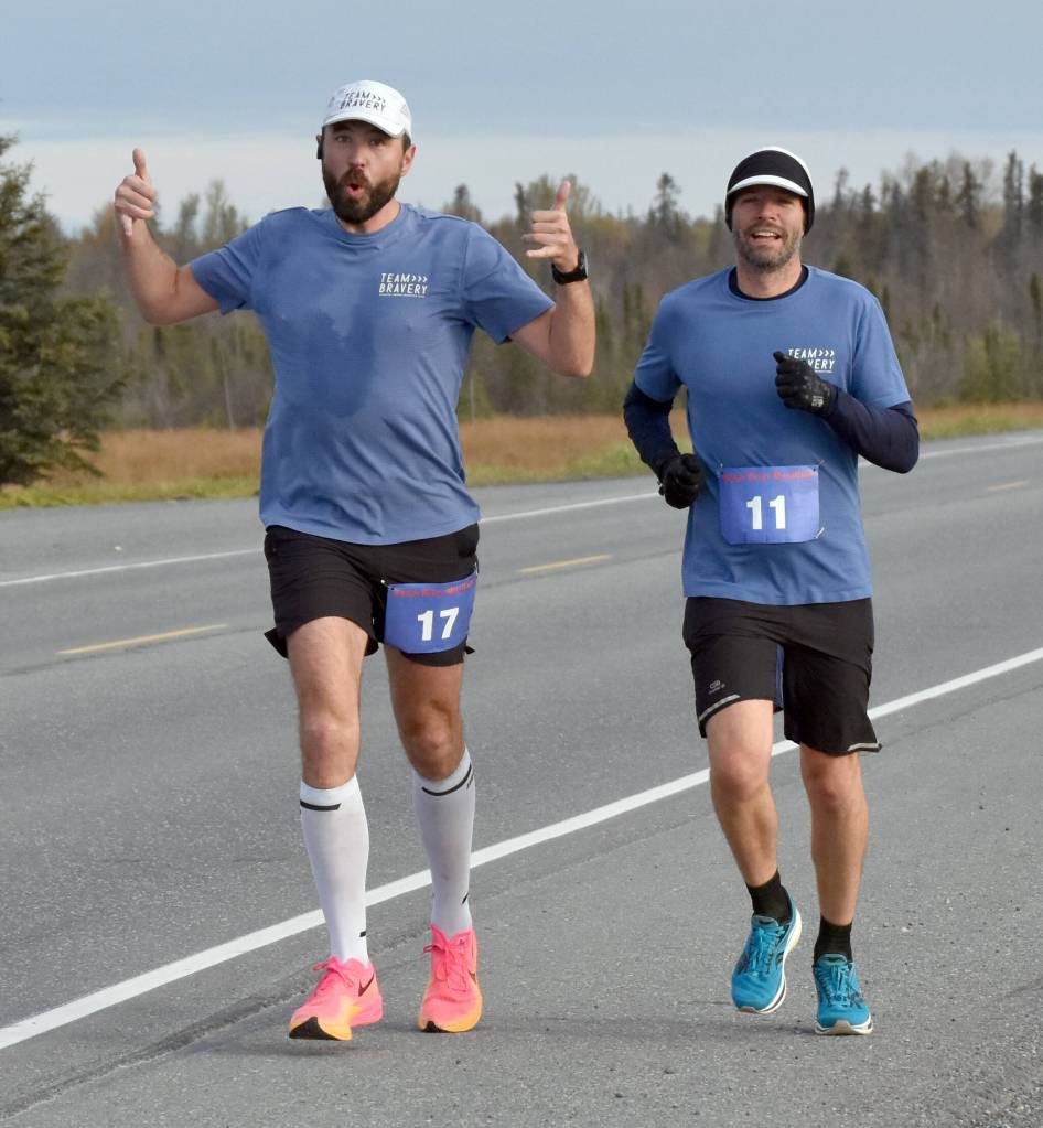 Zar Toolan and Michael Roy, both of St. Louis, run the mens marathon at the Kenai River Marathon on Sunday, Sept. 24, 2023, in Kenai, Alaska. Roy finished first, while Toolan was second. (Photo by Jeff Helminiak/Peninsula Clarion)