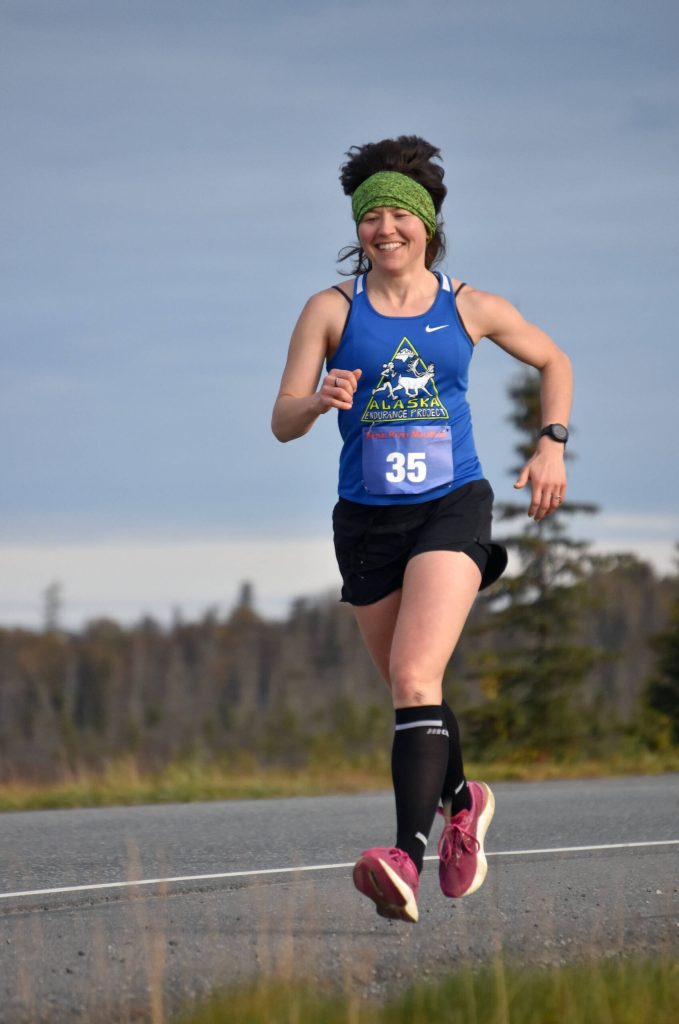 Julianne Dickerson of Anchorage runs to victory in the womens marathon at the Kenai River Marathon on Sunday, Sept. 24, 2023, in Kenai, Alaska. (Photo by Jeff Helminiak/Peninsula Clarion)