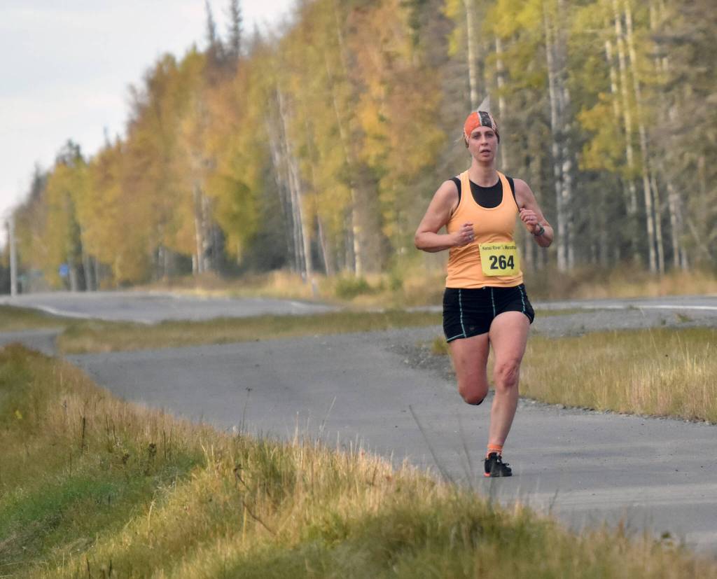 Elizabeth Roedl of Homer runs in the womens half marathon at the Kenai River Marathon on Sunday, Sept. 24, 2023, in Kenai, Alaska. Roedl finished second. (Photo by Jeff Helminiak/Peninsula Clarion)