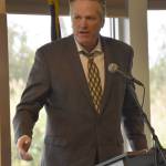 Gov. Mike Dunleavy speaks a signing ceremony for a project partnership agreement for the Kenai Bluff Stabilization Project at the Kenai Senior Center on Monday, Sept. 25, 2023, in Kenai, Alaska. (Jeff Helminiak/Peninsula Clarion)