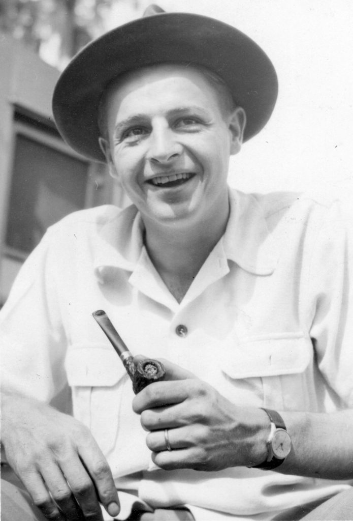 [Larry w pipe (add to Part 7 )--] Larry relaxes with his pipe, probably in the 1950s. (Photo courtesy of the Lancashire Family Collection.)