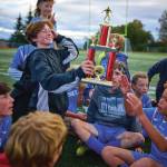 Homer Middle School boys celebrate win of the fall soccer trophy on Sunday, Oct. 1 at the Homer Mariner field. (Photo provided by Christopher Kincaid)