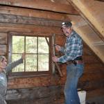 Anne Coray (left) and her husband, Steve Kahn (right) work in the loft of Brown Carlsons cabin on Lake Clark during their rebuilding project in September 2018. Photo provided by Anne Coray and Steve Kahn