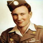 After being honorably discharged from the U.S. Army in 1945, Arlon Elwood Jackson Ball posed for this photograph, demonstrating his five years of military service through his many ribbons, badges and patches. (Photo courtesy of the Ball Family Collection)