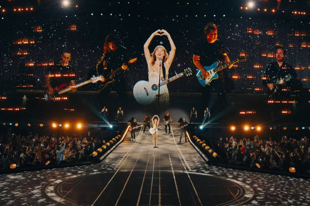 Taylor Swift performs songs from her album Fearless in Taylor Swift: The Eras Tour. (Promotional image courtesy Taylor Swift Productions)