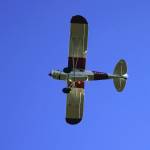 A pumpkin is released from a plane during Kenai Aviations Fifth Annual Pumpkin Drop at the Kenai Airpark in Kenai, Alaska, on Saturday, Oct. 21, 2023. (Jake Dye/Peninsula Clarion)