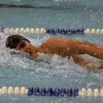 Sewards Bengimin Ambrosiani helps his team to victory in the 400-yard freestyle relay Saturday, Oct. 28, 2023, at the Northern Lights Conference swim meet at Soldotna High School in Soldotna, Alaska. (Photo by Jeff Helminiak/Peninsula Clarion)