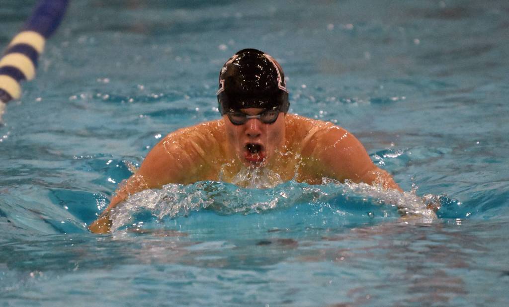 Kenai Centrals David Price takes second in the 100-yard breaststroke Saturday, Oct. 28, 2023, at the Northern Lights Conference swim meet at Soldotna High School in Soldotna, Alaska. (Photo by Jeff Helminiak/Peninsula Clarion)