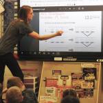 Mountain View Elementary School first grade teacher Callie Giordano leads her students in a literacy skills exercise on Thursday, Oct. 19, 2023, in Kenai, Alaska. (Ashlyn OHaara/Peninsula Clarion)