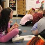 Callie Giordanos first grade Mountain View Elementary School students practice literacy skills on Thursday, Oct. 19, 2023, in Kenai, Alaska. (Ashlyn OHaara/Peninsula Clarion)