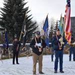 American Legion Post 16 commander and Coast Guard veteran Ronald Brahm (front left) gives the address during the Veterans Day service at the Alaska Maritime National Wildlife Refuge Visitor Center on Saturday, Nov. 11, 2023 in Homer, Alaska. (Delcenia Cosman/Homer News)