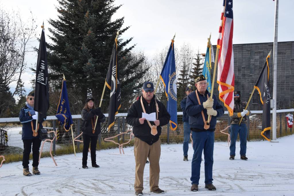 American Legion Post 16 commander and Coast Guard veteran Ronald Brahm (front left) gives the address during the Veterans Day service at the Alaska Maritime National Wildlife Refuge Visitor Center on Saturday, Nov. 11, 2023 in Homer, Alaska. (Delcenia Cosman/Homer News)