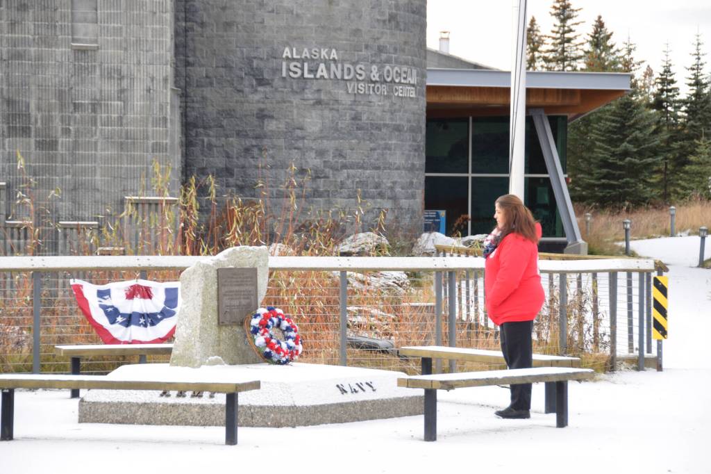 A wreath is placed on the American Legion General Buckner Post/Unit 16 Veterans Memorial during the Veterans Day service at the Alaska Maritime National Wildlife Refuge Visitor Center on Saturday, Nov. 11, 2023 in Homer, Alaska. (Delcenia Cosman/Homer News)