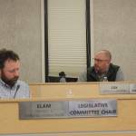 Assembly members Bill Elam, left, and Tyson Cox, right, discuss during a Kenai Peninsula Borough Assembly meeting a resolution only permitting certain chaplains to deliver invocations before borough assembly meetings on Tuesday, Nov. 7, 2023 in Soldotna, Alaska. (Ashlyn OHara/Peninsula Clarion)