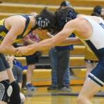 Homer's Bryce Hagge competes against Soldotna's Grady Abrams at 112 pounds at the Homer Round Robin Rumble on Saturday, Nov. 11, 2023, at Homer High School in Homer, Alaska. (Photo by Finn Heimbold/Homer News)