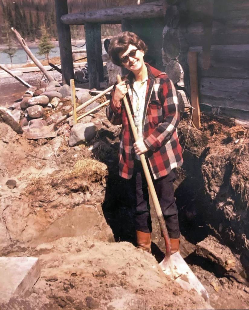 Betty Fuller, working with a shovel outside the Cooper Landing Post Office in 1969, was among the first to suggest that her towns first post office had been named for a postal official. (Photo courtesy of Mona Painter)