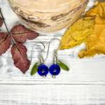 Blueberry earrings by 97North are on display at the Art Shop Gallerys December exhibit. Photo provided by Art Shop Gallery