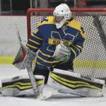 Photo by Jeff Helminiak/Peninsula Clarion
Homers Blaise Banks makes a save against Kenai Central on Thursday, Nov. 30, 2023, at the Kenai Multi-Purpose Facility in Kenai, Alaska.