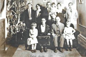 Peter and Pearl Bodnar (front, center) pose for a 1930 Christmas portrait with much of their family, probably in Manitoba, Canada. Pictured are: (back row, L-R) Alex, sister Anna (Bodnar) Bandura, brother Michael holding daughter Pearl next to his wife Jessie, and Marcus. In the front row are: Michaels eldest daughter Olga, parents Parascevies Pearl and Peter Bodnar, and Michaels middle daughter Marion. (Photo courtesy of the Bodnar Family Collection)