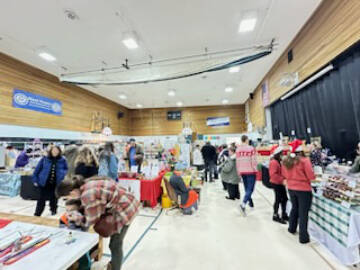Community members shop the Procrastinators Fair at West Homer Elementary on Saturday, Dec. 9, 2023 in Homer, Alaska. Photo courtesy of Callie Steinberg