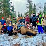 Students from Nikiski Middle/High School and Kenai Middle School join Jesse Bjorkman, Ken Felchle and volunteers from the Kenai Peninsula Chapter of Safari Club International on an educational moose hunt in Nikiski, Alaska, on Saturday, Dec. 2, 2023. (Photo provided by Jesse Bjorkman)