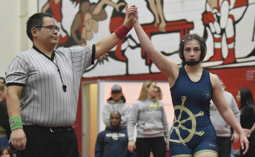 Homer's Saoirse won the title at girls 126 pounds at the Kachemak Conference wrestling tournament at Kenai Central High School in Kenai, Alaska, on Saturday, Dec. 9, 2023. (Photo by Jeff Helminiak/Peninsula Clarion)
