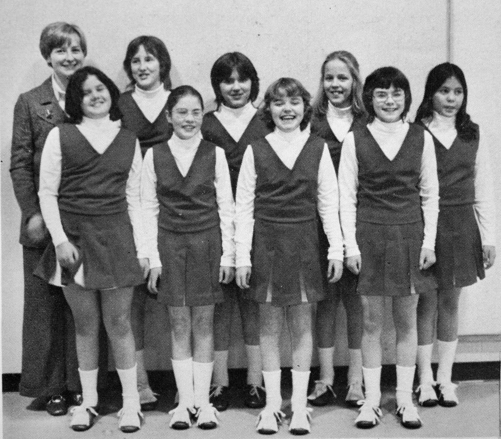 Bev Edwards, too, had duties beyond teaching in the classroom. Here, she poses with the schools 1973-74 cheerleading squad, for which she was the sponsor. (Image courtesy of Rex and Beverly Edwards)