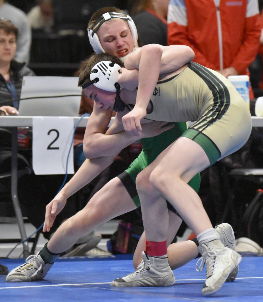 Sewards Ridge Conant works his way to a pin of Haines Hayden Jimenez in the Division II final at 112 pounds Saturday, Dec. 16, 2023, at the state wrestling tournament at the Alaska Airlines Center in Anchorage, Alaska. (Photo by Jeff Helminiak/Peninsula Clarion)