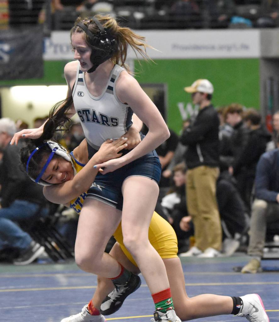 Soldotnas Kaytlin McAnelly wrestles to a 6-4 decision over Bethels Isabel Lieb in the girls title match at 132 pounds Saturday, Dec. 16, 2023, at the state wrestling tournament at the Alaska Airlines Center in Anchorage, Alaska. (Photo by Jeff Helminiak/Peninsula Clarion)