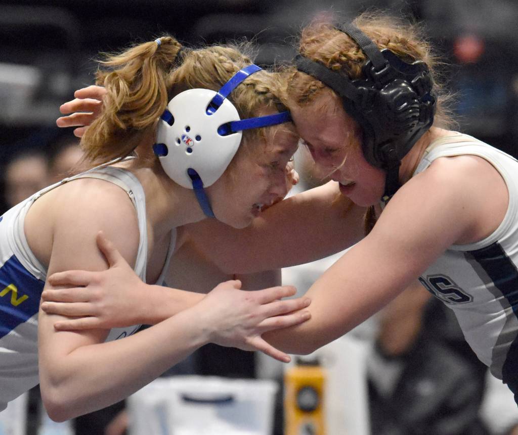 Soldotnas Rowan Peck wrestles her way to a 4-3 decision over Newhalens Pagan Lester in the girls title match at 120 pounds Saturday, Dec. 16, 2023, at the state wrestling tournament at the Alaska Airlines Center in Anchorage, Alaska. (Photo by Jeff Helminiak/Peninsula Clarion)