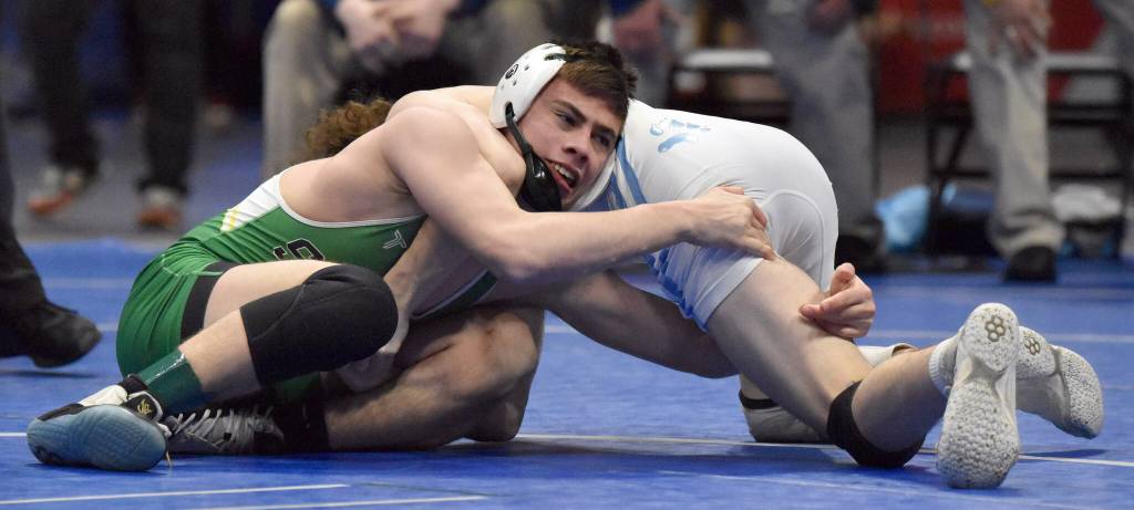 Sewards Aiden Schilling loses a 4-2 decision to Dillinghams Dylan Mccambly in the Division II final at 119 pounds Saturday, Dec. 16, 2023, at the state wrestling tournament at the Alaska Airlines Center in Anchorage, Alaska. (Photo by Jeff Helminiak/Peninsula Clarion)