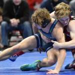 Kenai Centrals Daniel Steffensen wrestles to a 22-13 victory over Redingtons Aidan Laselle in the Division II title match at 140 pounds Saturday, Dec. 16, 2023, at the state wrestling tournament at the Alaska Airlines Center in Anchorage, Alaska. (Photo by Jeff Helminiak/Peninsula Clarion)