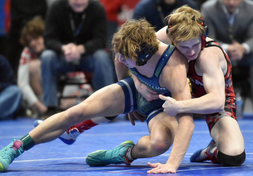 Kenai Centrals Daniel Steffensen wrestles to a 22-13 victory over Redingtons Aidan Laselle in the Division II title match at 140 pounds Saturday, Dec. 16, 2023, at the state wrestling tournament at the Alaska Airlines Center in Anchorage, Alaska. (Photo by Jeff Helminiak/Peninsula Clarion)
