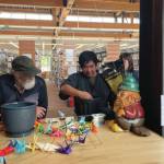 Emilie Springer/Homer News
Mayor Ken Castner (left) and Kevin Co replant the Peace Tree sprout on Sunday, Aug. 6<ins>, 2023</ins> at the Homer Public Library<ins> in Homer, Alaska</ins>.