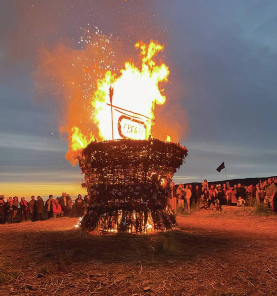 Homers 20th Burning Basket, Create, is engulfed in flames at Mariner Park Beach on Sunday, Sept. 10,<ins> 2023</ins> at sundown<ins> in Homer, </ins><ins>Alaska</ins>. (Emilie Springer/Homer News)