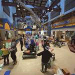 More than 90 community volunteers help pack food and gift baskets for households in need as part of the annual Share the Spirit holiday donation drive on Wednesday, Dec. 20<ins>, 2023</ins> in the Homer High School commons<ins> in Homer, Alaska</ins>. Working from 9 a.m. to approximately 3 p.m., volunteers packed 273 baskets. This years drive also provided goods and gifts for 300 kids. Photo courtesy of Emmy Olsen-Drye