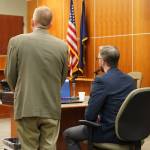 Lawyer Eric Derleth and his client Nathan Erfurth, a former Soldotna High School teacher accused of sexually abusing one of his students, submit a not guilty plea at an arraignment hearing on Tuesday, July 11, 2023, at the Kenai Courthouse in Kenai, Alaska. (Jake Dye/Peninsula Clarion)