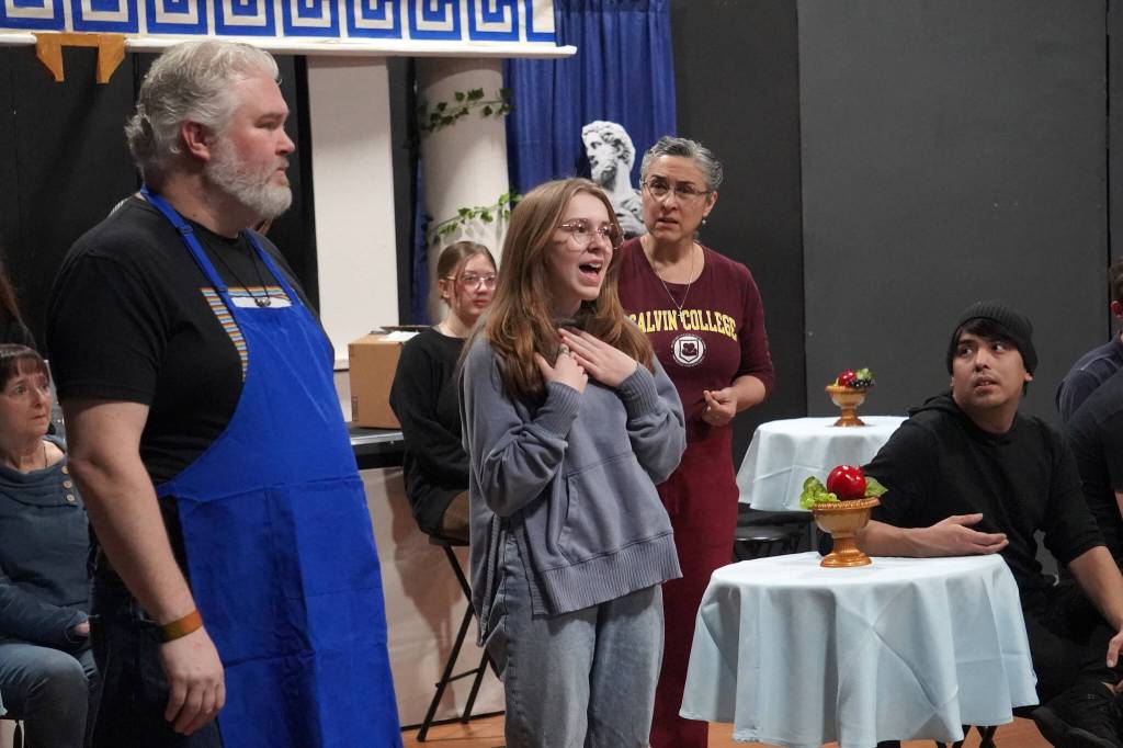 David Brighton, Cora Frazier, Lara Lindeman and James Starkloff rehearse Greece is the Word: The Zeusical at the Kenai Performers Theatre in Soldotna, Alaska, on Saturday, Jan. 6, 2024. (Jake Dye/Peninsula Clarion)