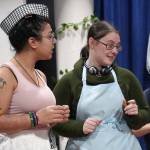 Kassándra Feltman portrays Pandora and Heather Prisk portrays Cassandra during a rehearsal of Greece is the Word: The Zeusical at the Kenai Performers Theatre in Soldotna, Alaska, on Saturday, Jan. 6, 2024. (Jake Dye/Peninsula Clarion)