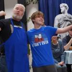 David Brighton portrays Zeus and Gage Sturman portrays Narcissus during a rehearsal of Greece is the Word: The Zeusical at the Kenai Performers Theatre in Soldotna, Alaska, on Saturday, Jan. 6, 2024. (Jake Dye/Peninsula Clarion)