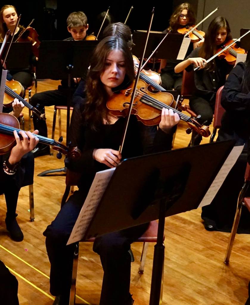 Maggie Mae Gaylord, winner of the 2023 Diane Borgman Youth Artist of the Year award, plays in the All-State high school orchestra in Anchorage in the fall of 2023. Photo provided by ASAA