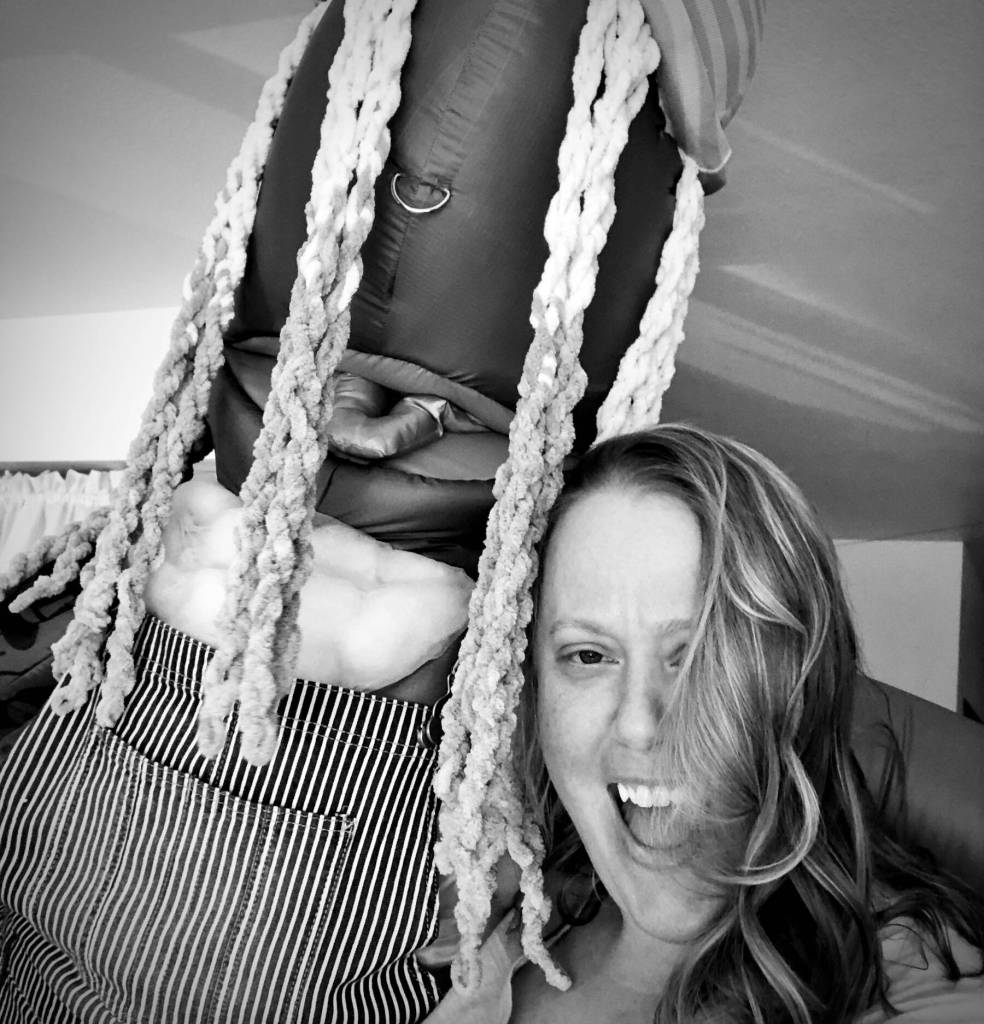 Abigail Kokai, winner of the 2023 Artist of the Year award, is photographed with Yella, an inflatable character she created in 2020. Photo provided by Abigail Kokai