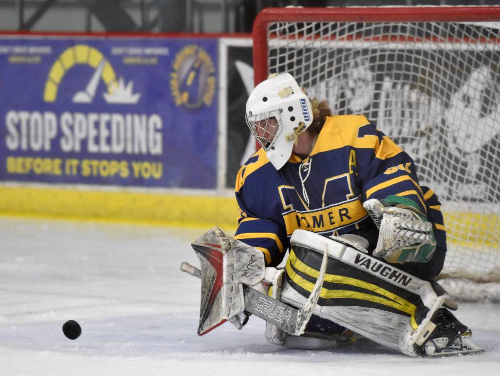 Homers Blaise Banks makes a save against Soldonta on Thursday, Jan. 18, 2024, at the Soldotna Regional Sports Complex in Soldotna, Alaska. (Photo by Jeff Helminiak/Peninsula Clarion)