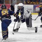 Soldotna's Daniel Heath makes a move on Homer's Ethan Drake on Thursday, Jan. 18, 2024, at the Soldotna Regional Sports Complex in Soldotna, Alaska. (Photo by Jeff Helminiak/Peninsula Clarion)