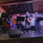 Photo by Emilie Springer/Homer News
Banned musicians Scott Bartlett, Martie Krohn, Cindy McKenna and Cathy Stingley provide music at the opening night for the Big Read at Alices Champagne Palace on Friday.