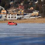 Drivers enjoy racing their cars on the ice of the frozen Beluga Lake on Saturday, Jan. 27, 2024 in Homer, Alaska. (Delcenia Cosman/Homer News)