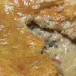 A creamy, rich and filling is ensconced a puff pastry crust in this French chicken and mushroom pie. (Photo by Tressa Dale/Peninsula Clarion)