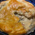 A creamy, rich and filling is ensconced a puff pastry crust in this French chicken and mushroom pie. (Photo by Tressa Dale/Peninsula Clarion)