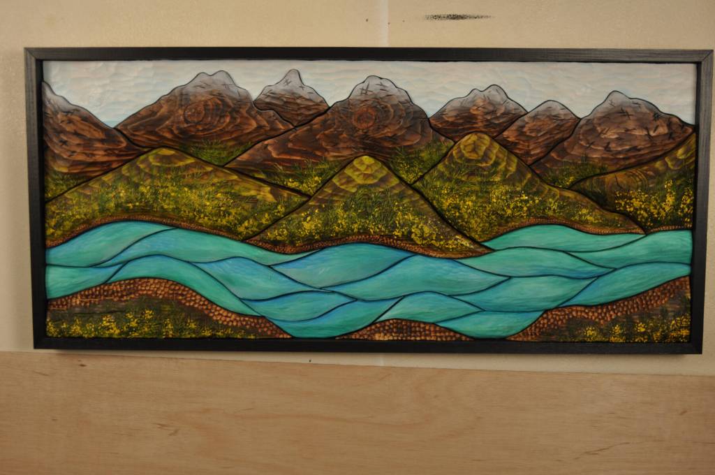 Termination Dust on the Kenai River by Deb Lowney is a torched wood piece made from local spruce, acrylic and oil paint that was part of the 2022-23 Changing Landscapes exhibit at Bunnell Street Arts Center. Photo provided by Deb Lowney