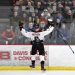Houstons Daniel Matveev celebrates a goal in front of an unimpressed Soldotna student section at the Division II state hockey tournament Saturday, Feb. 3, 2024, at the Soldotna Regional Sports Complex in Soldotna, Alaska. (Photo by Jeff Helminiak/Peninsula Clarion)